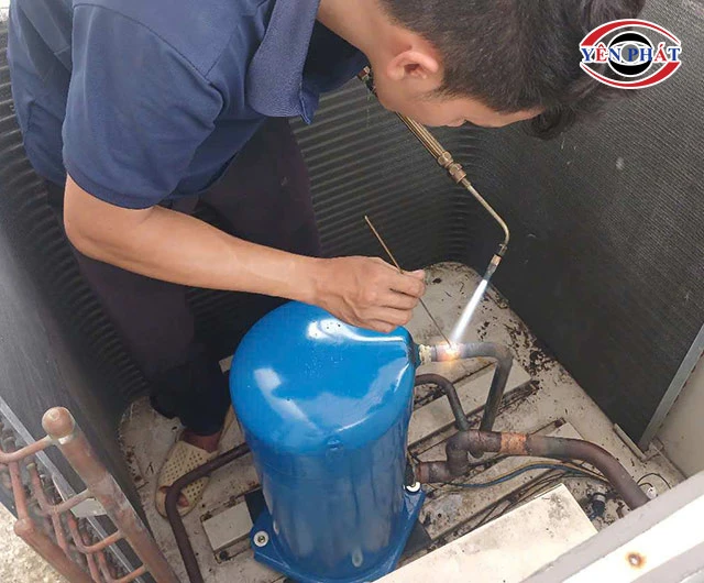 hàn mối máy nén điều hòa